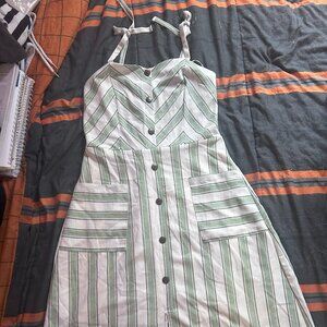 green and white mid length dress